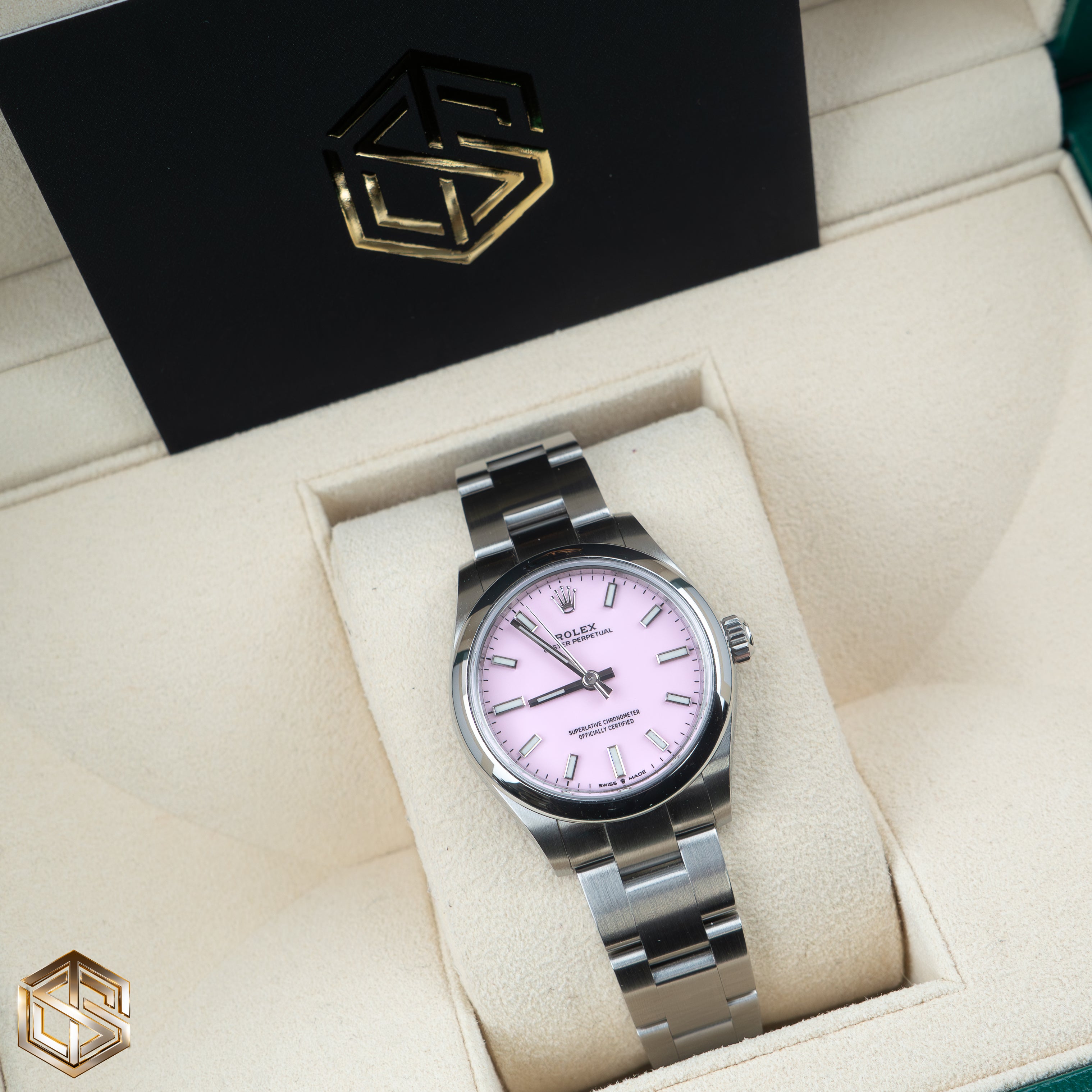 Rolex oyster perpetual candy pink price hot sale