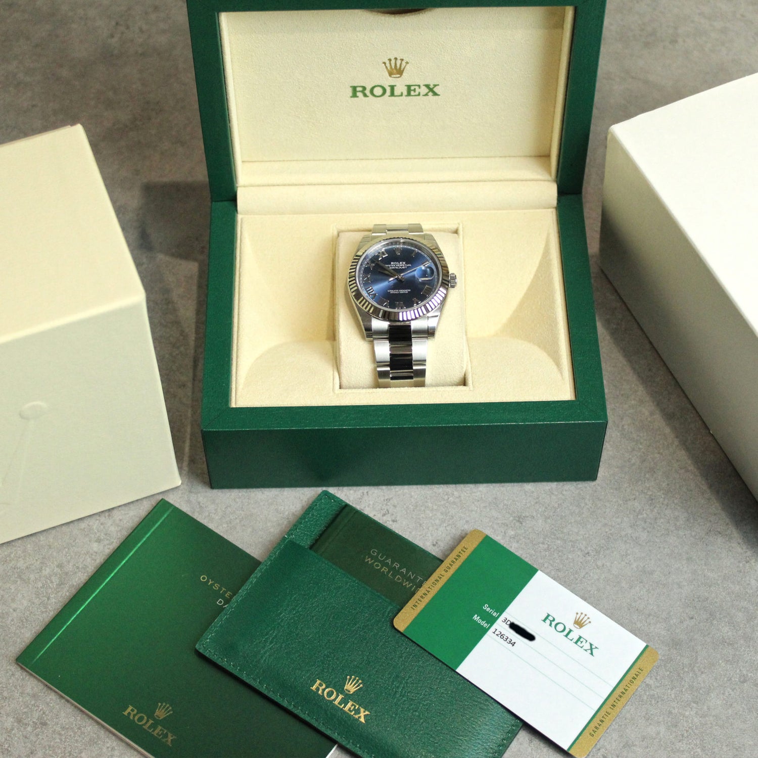 Rolex Datejust 41 126334 Blue Roman Numeral Dial Watch Unworn